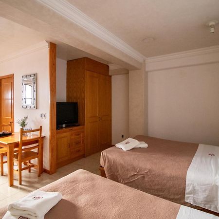 Suites Sevilla Пуэбла Экстерьер фото
